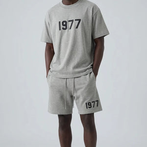 Fear of God Essentials 1977 Donkere Havermout Zomerset