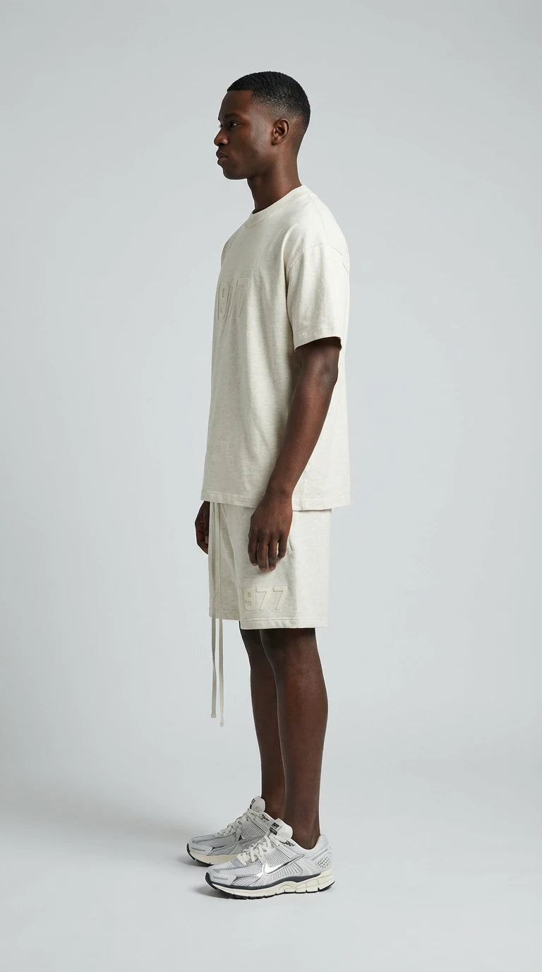 Fear of God Essentials 1977 Lichte havermout zomerset